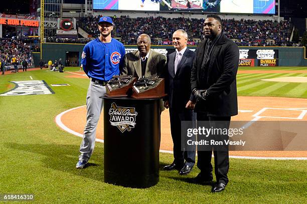 Hank Aaron Award Recipients David Ortiz of the Boston Red Sox and Kris Bryant of the Chicago Cubs pose for a photo with Hall of Famer Hank Aaron and...