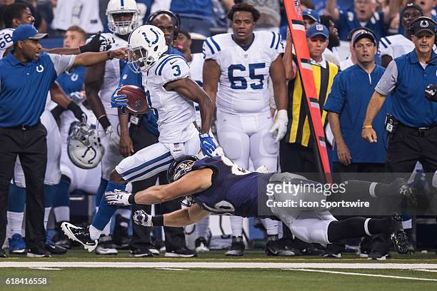 Baltimore Ravens tight end Nick Boyle dives at Indianapolis Colts wide receiver Chester Rogers during the NFL preseason week 2 game between the...