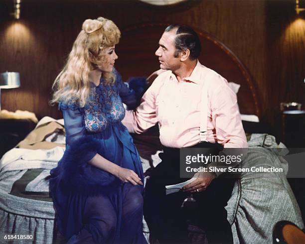 Actors Stella Stevens as Linda Rogo and Ernest Borgnine as Detective Lieutenant Mike Rogo in a scene from the disaster film 'The Poseidon Adventure',...