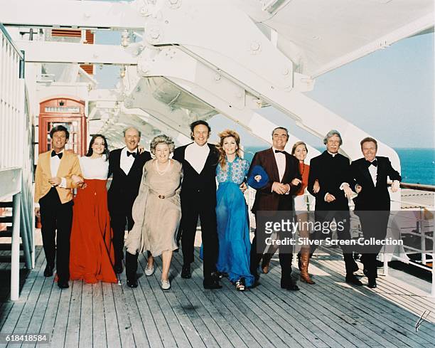 From left to right, Roddy McDowall, Pamela Sue Martin, Jack Albertson, Shelley Winters, Gene Hackman, Stella Stevens, Ernest Borgnine, Carol Lynley,...