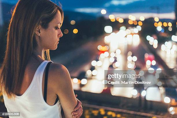 depressed woman in the city - suicide stock pictures, royalty-free photos & images