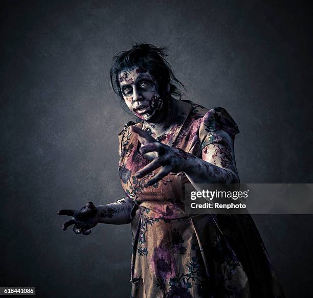 scary zombie sobre fondo negro - zombie makeup fotografías e imágenes de stock