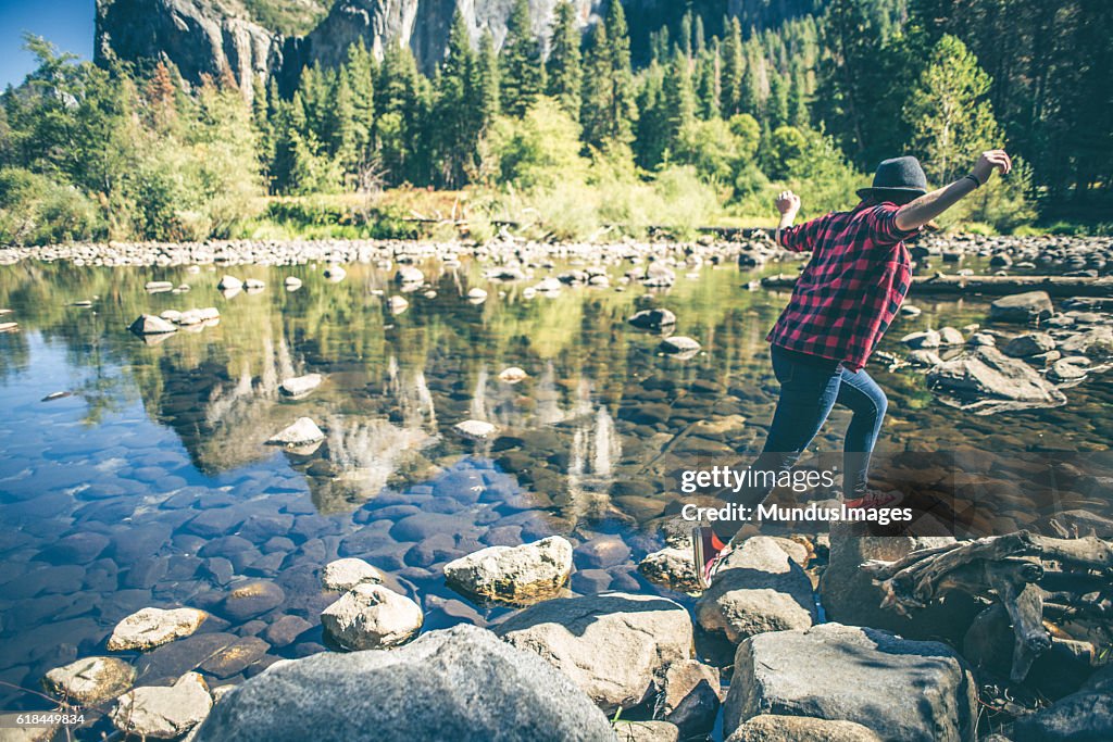 Young woman hiking in majestic landscape