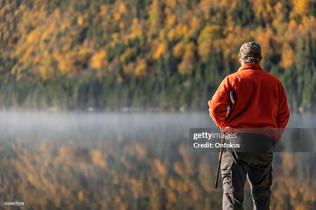 Senior Man Hunter Relaxing in Nature