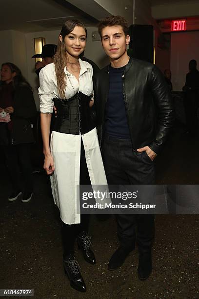 Gigi Hadid and Nolan Funk attend Stuart Weitzman's Launch Of The Gigi Boot on October 26, 2016 in New York City.