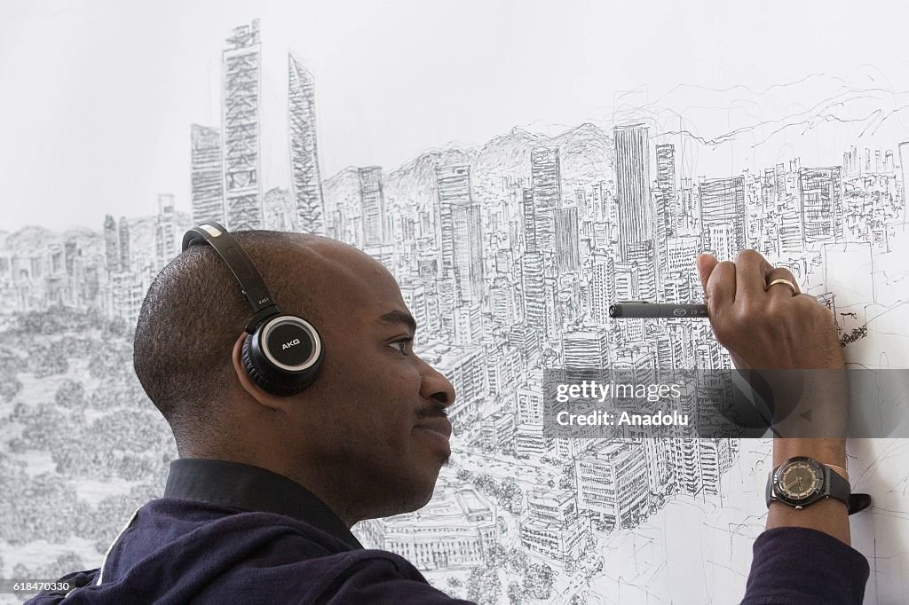 British artist Stephen Wiltshire draws cityscape of Mexico City