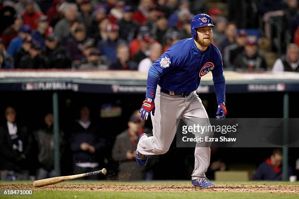 Ben Zobrist of the Chicago Cubs runs after hitting an RBI triple to score Anthony Rizzo during the fifth inning against the Cleveland Indians in Game...