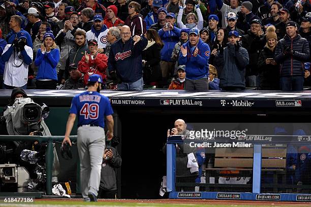Jake Arrieta of the Chicago Cubs walks back to the dugout after being relieved during the sixth inning against the Cleveland Indians in Game Two of...