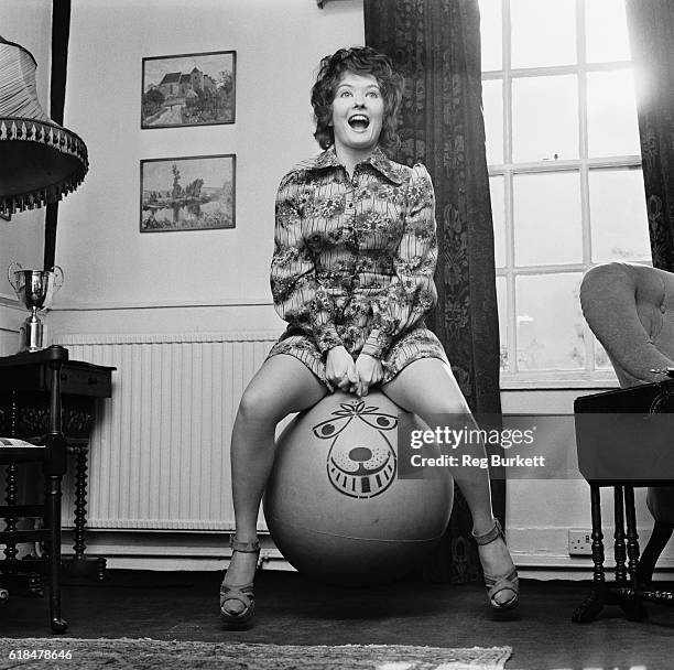 English actress Deborah Watling on a space hopper, UK, 16th November 1971.