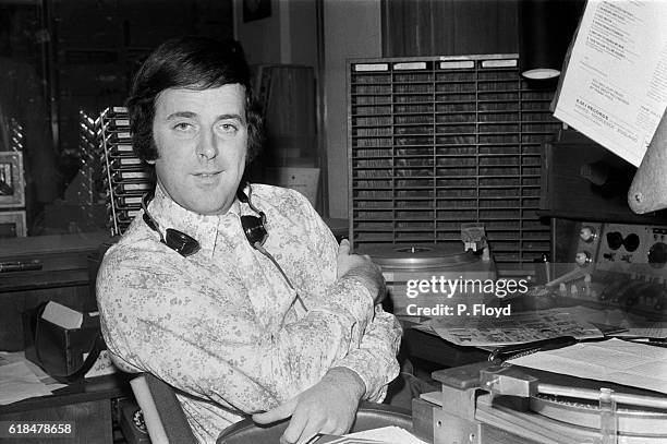 Radio disc jockey Terry Wogan in a radio studio, UK, 23rd November 1971.