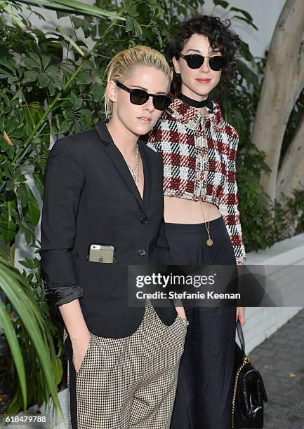 Actress Kristen Stewart and musician Annie Clark of St. Vincent at the CFDA/Vogue Fashion Fund Show and Tea presented by kate spade new york at...