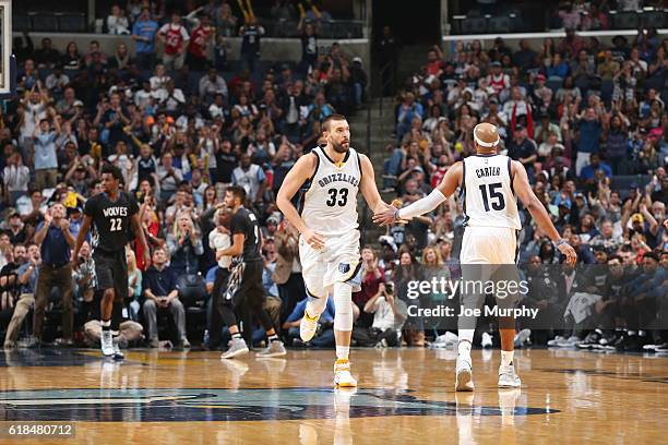 Marc Gasol celebrates with Vince Carter of the Memphis Grizzlies during a game against the Minnesota Timberwolves on October 26, 2016 at FedExForum...