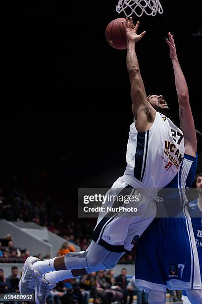 Sadiel Rojas of UCAM Murcia and Sergey Karasev of Zenit vie for the ball during the EuroCup Round 3 regular season basketball match between Zenit and...