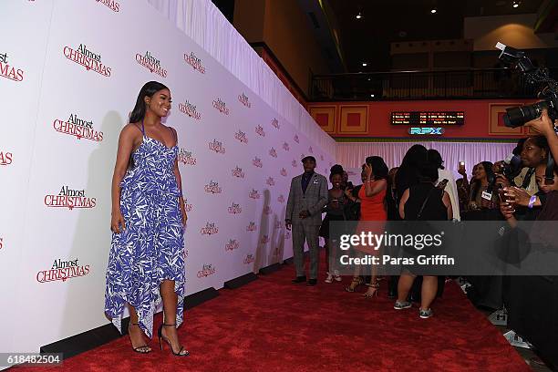 Actress Gabrielle Union attends "Almost Christmas" Atlanta screening at Regal Cinemas Atlantic Station Stadium 16 on October 26, 2016 in Atlanta,...