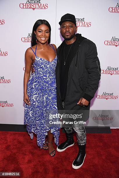 Gabrielle Union and Omar Epps attend "Almost Christmas" Atlanta screening at Regal Cinemas Atlantic Station Stadium 16 on October 26, 2016 in...