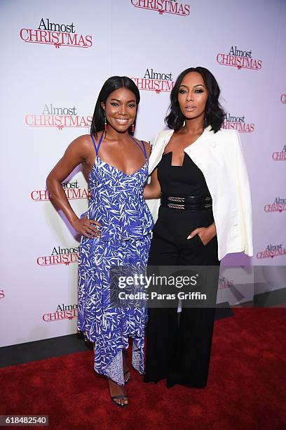 Gabrielle Union and Keri Hilson attend "Almost Christmas" Atlanta screening at Regal Cinemas Atlantic Station Stadium 16 on October 26, 2016 in...