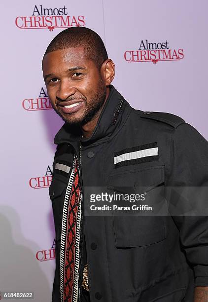 Usher Raymond attends "Almost Christmas" Atlanta screening at Regal Cinemas Atlantic Station Stadium 16 on October 26, 2016 in Atlanta, Georgia.