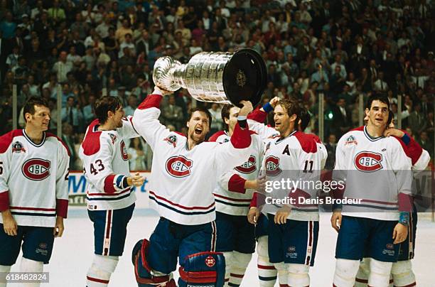 Patrick Roy of the Montreal Canadiens celebrates with the Stanley Cup after the Canadiens won Game 5 of the 1993 Stanley Cup Final over the Los...