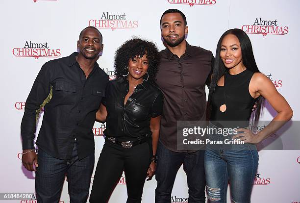 Keith Robinson, Vanessa Bell Calloway, Christain Keys, and Dawn Halfkenny attends "Almost Christmas" Atlanta screening at Regal Cinemas Atlantic...