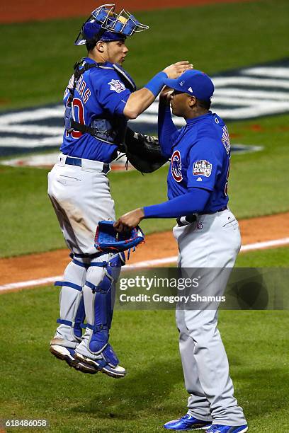 Willson Contreras of the Chicago Cubs celebrates with Aroldis Chapman after defeating the Cleveland Indians 5-1 in Game Two of the 2016 World Series...