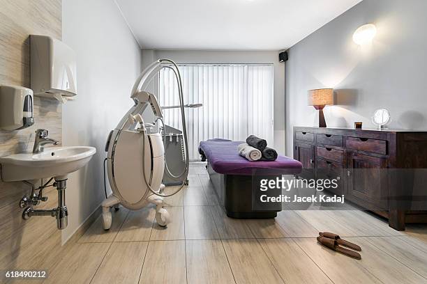 massage room interior - beauty spa stock pictures, royalty-free photos & images