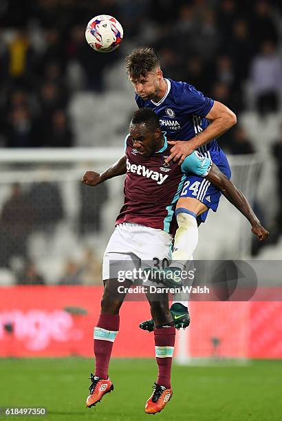Gary Cahill of Chelsea wins a a header above Michail Antonio of West Ham in action during the EFL Cup fourth round match between West Ham United and...