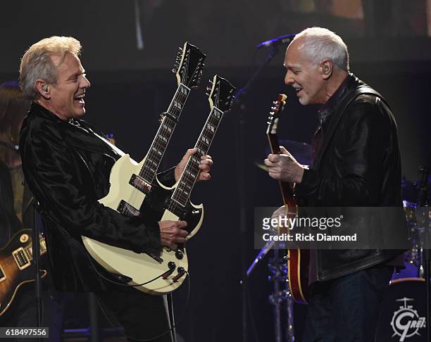 Injductee Don Felder is joined on stage by Peter Frampton during the Musicians Hall Of Fame 2016 Induction Ceremony & show at Nashville Municipal...
