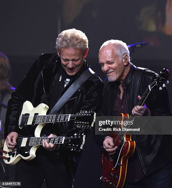 Injductee Don Felder is joined on stage by Peter Frampton during the Musicians Hall Of Fame 2016 Induction Ceremony & show at Nashville Municipal...