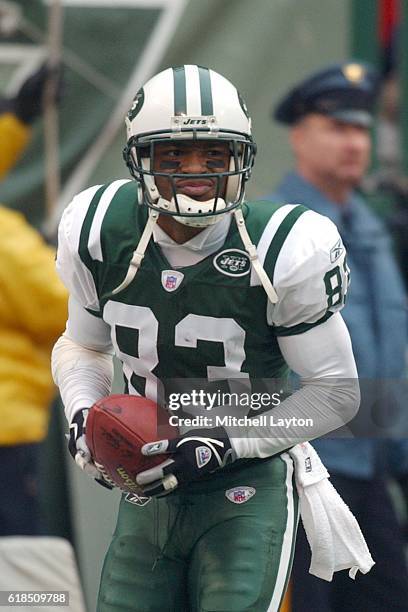 Santana Moss of the New York Jets looks on during a football game against Seattle Seahawks at Giants Stadium on December 19, 2004 in East Rutherford,...