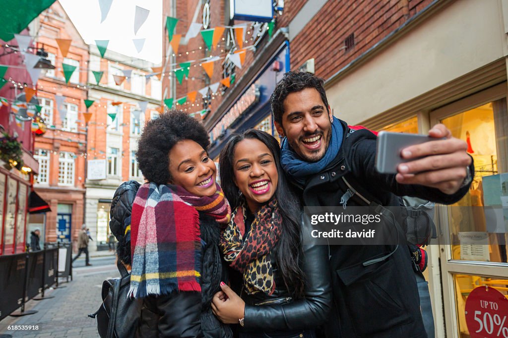 Tourists Taking Selfies on Vacation in Dublin Ireland