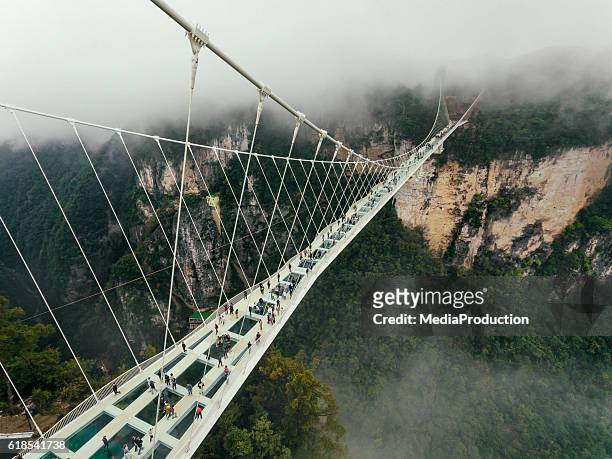 glass bridge of zhangjiajie china - bridge stock pictures, royalty-free photos & images