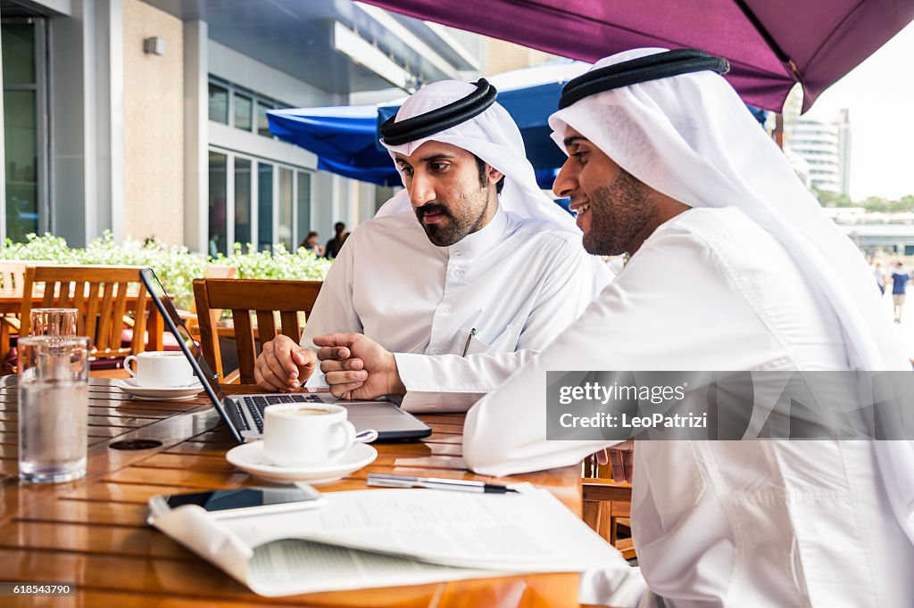 Talking about business at a cafe in Dubai