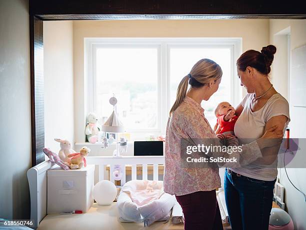 family cuddles - adoption stock pictures, royalty-free photos & images