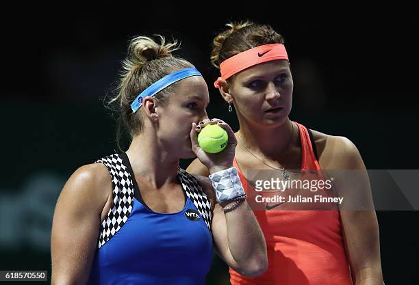 Bethanie Mattek-Sands of the United States and Lucie Safarova of Czech Republic talk in their doubles match against Yaroslava Shvedova of Kazakhstan...