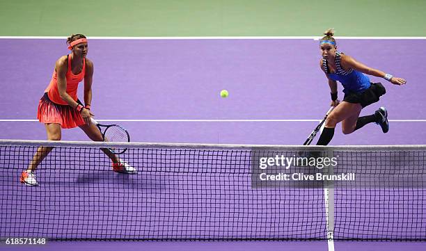 Lucie Safarova of Czech Republic and Bethanie Mattek-Sands of the United States in action in their doubles match against Yaroslava Shvedova of...