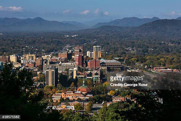 The downtown skyline is viewed on a sunny autumn day on October 20, 2016 near Asheville, North Carolina. Named one of the "Top 10 Great Places to...