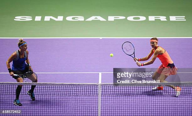 Lucie Safarova of Czech Republic and Bethanie Mattek-Sands of the United States in action in their doubles match against Yaroslava Shvedova of...