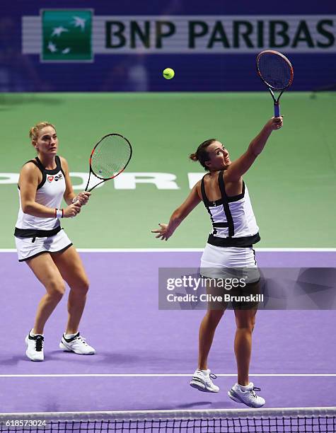 Yaroslava Shvedova of Kazakhstan and Timea Babos of Hungary in action in their doubles match against Bethanie Mattek-Sands of the United States and...