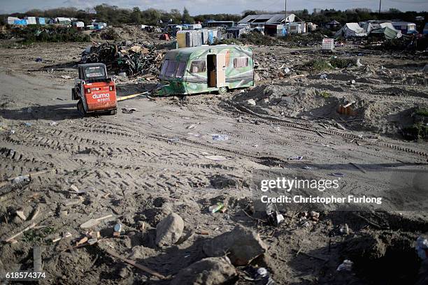 Large parts of the Calais 'Jungle' migrant camp are cleared as contractors demolish the site on October 27, 2016 in Calais, France. Authorities have...