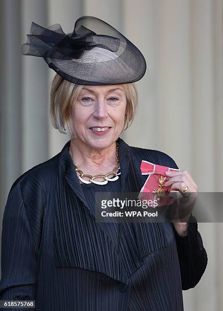 Eileen Cooper poses after receiving her Officer of the Order of the British Empire at Buckingham Palace on October 27, 2016 in London, England.