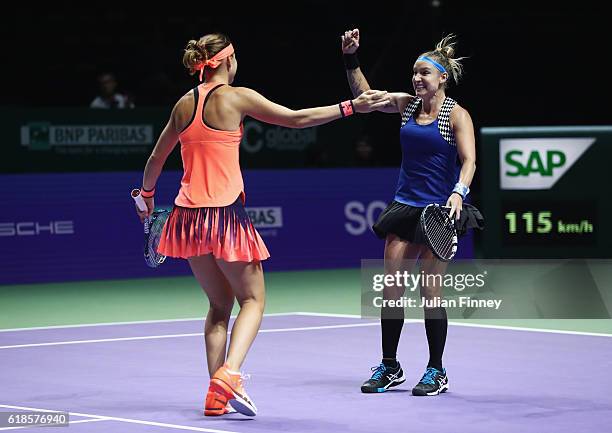 Bethanie Mattek-Sands of the United States and Lucie Safarova of Czech Republic celebrate victory in their doubles match against Yaroslava Shvedova...