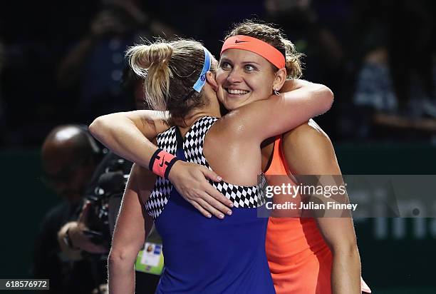 Lucie Safarova of Czech Republic and Bethanie Mattek-Sands of the United States celebrate victory in their doubles match against Yaroslava Shvedova...