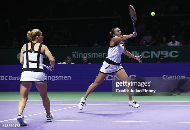 Yaroslava Shvedova of Kazakhstan and Timea Babos of Hungary in action in their doubles match against Bethanie Mattek-Sands of the United States and...