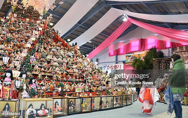 Katsuura, Japan - Around 30,000 old ''hina'' dolls, collected from homes nationwide, are displayed on an 8-meter-high pyramid stand in the town of...