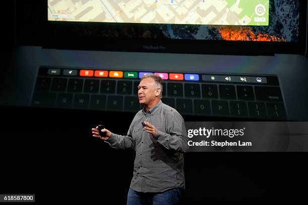 Apple Senior Vice President of Worldwide Marketing Phil Schiller speaks on the new Apple TouchBar during a product launch event on October 27, 2016...