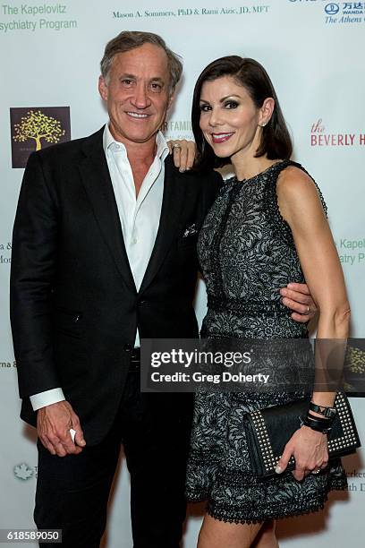 Reality TV Star Heather Dubrow and Reality Star and Plastic Surgeon Terry Dubrow arrive for the 42nd Annual Maple Ball at The Montage Hotel on...