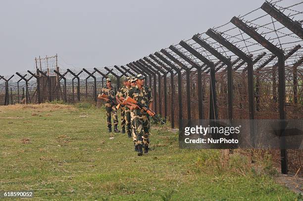Indian Border Security Force soldiers patrolling at the near Petrapole Border outpost at the India-Bangladesh Border on the outskirts of...