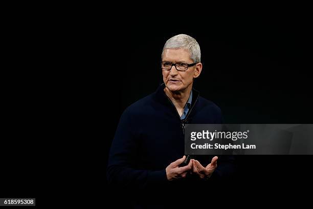 Apple CEO Tim Cook speaks on stage during a product launch event on October 27, 2016 in Cupertino, California. Apple Inc. Unveiled the latest...