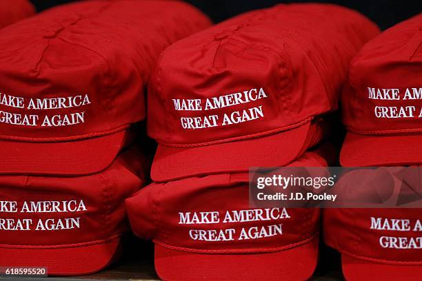 Baseball caps surpporting Republican presidential nominee Donald Trump are seen for sale before a campaign event at the SeaGate Convention Centre on...