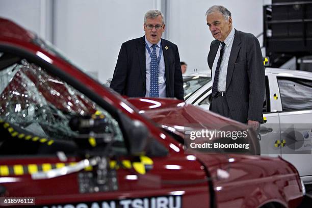 Ralph Nader, founder of Public Citizen Inc., right, looks at a 2015 Nissan Motor Co. Tsuru after being test crashed into a 2016 Nissan Motor Co....